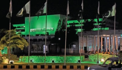 the parliament house has been illuminated with green lights to mark the first anniversary of marka e haq in the federal capital photo online