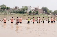 divers search for a youth feared drowned in a stream in narowal authorities have warned residents to avoid going near watercourses during the monsoon season photo nni