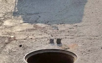 seven year old falls victim to open manhole