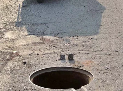 seven year old falls victim to open manhole