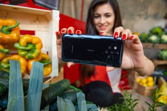 staff member maria arbalova demonstrates the nokia 9 pureview phone at the launch of the new range of nokia handsets photo nokia staff member maria arbalova demonstrates the nokia 9 pureview phone at the launch of the new range of nokia handsets photo nokia