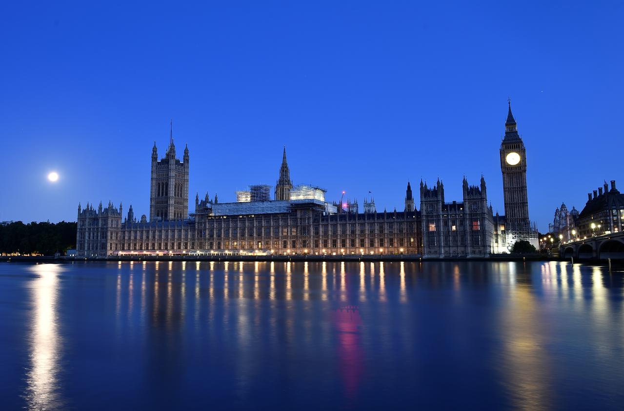 the sun rises over the houses of parliament in london britain photo reuters