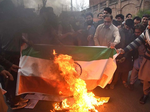 people burn indian flag in peshawar on tuesday photo app