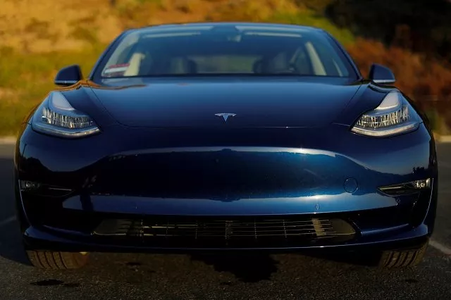 a 2018 tesla model 3 electric vehicle is shown in this photo illustration taken in cardiff california us june 1 2018 photo reuters a 2018 tesla model 3 electric vehicle is shown in this photo illustration taken in cardiff california us june 1 2018 photo reuters