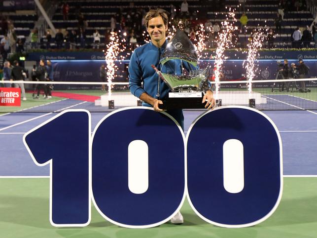 federer the winner of a record 20 grand slam titles won his 100th title comes 18 years after he captured his first in milan photo afp