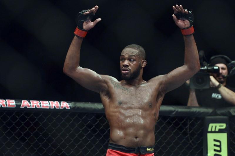 the 31 year old new yorker controlled the fight from start to finish using a dizzying array of kicks to control the distance and out wrestling smith against the fence photo reuters