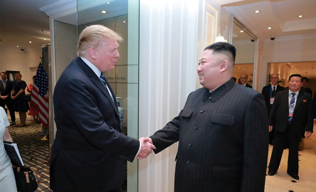 north korean leader kim jong un and us president donald trump shake hands in hanoi where they held a summit that was seen as a disappointment photo afp