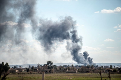 fireballs and black smoke billow from final is holdout in syria