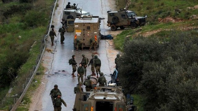 car rams into israeli troops in west bank attackers shot military
