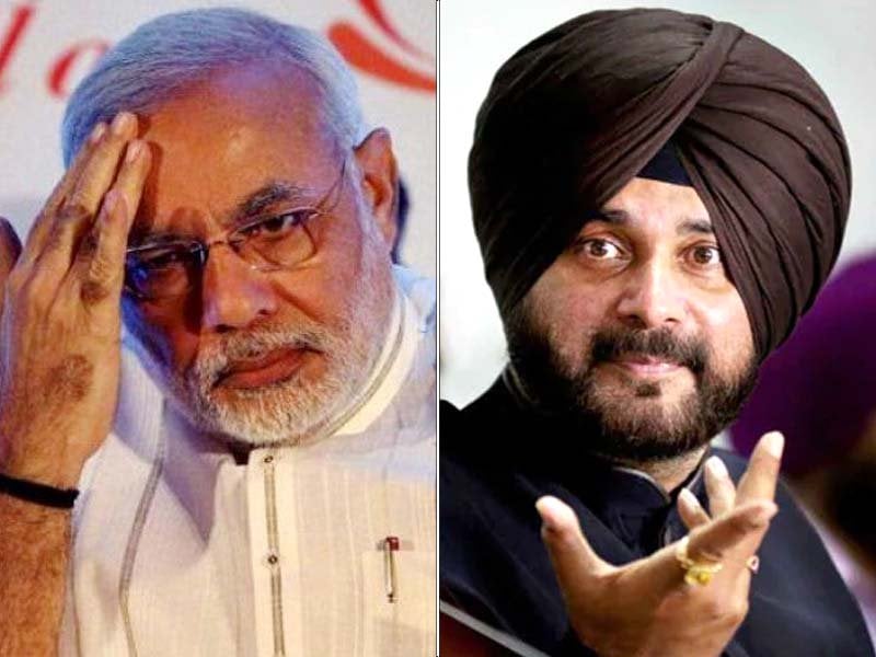 indian prime minister narendra modi left and cricketer turned politician navjot singh sidhu photo file