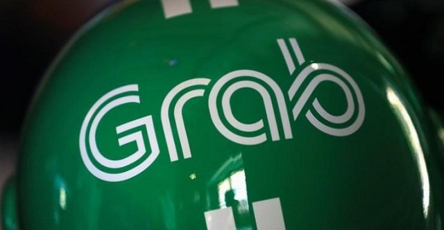 a grab motorbike helmet is displayed during grab 039 s fifth anniversary news conference in singapore june 6 2017 photo reuters