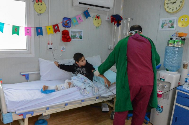 a patient receives treatment at the doctors without borders msf hospital in iraq 039 s mosul photo afp