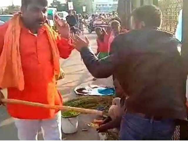 kashmiri vendors being beaten by bjp workers on a busy street in lucknow photo express