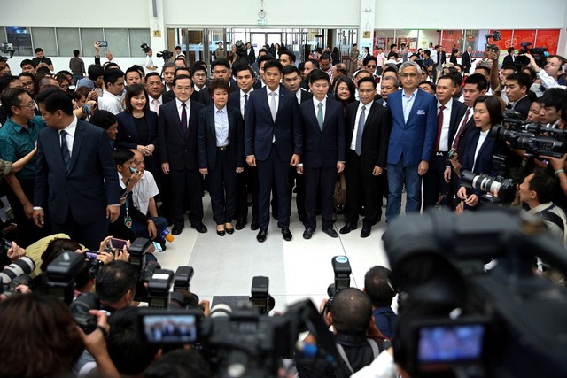 thai raksa chart party leader preechapol pongpanich and members of his party arrive at the constitutional court in bangkok thailand photo reuters