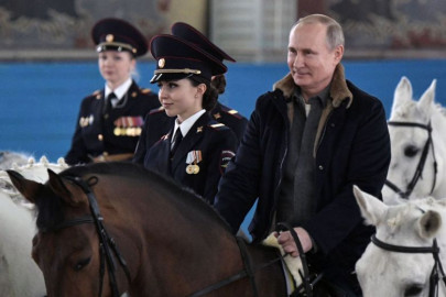 watch russia s putin rides horse with female police ahead of international women s day watch russia s putin rides horse with female police ahead of international women s day