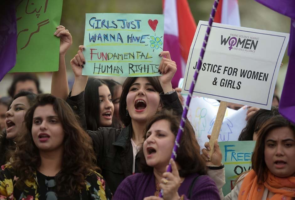 pakistani civil society activists carry placard and shout slogans during a rally for women rights on international women 039 s day in islamabad photo reuters