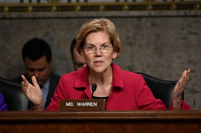 senator elizabeth warren d ma questions panelists testifying before senate armed services subcommittees on the military housing privatisation initiative in washington us february 13 2019 photo reuters