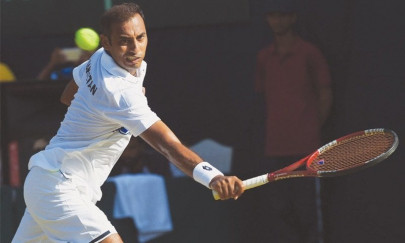 aqeel khan clinches kp open tennis title