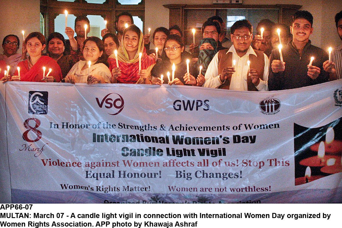 women right association organizes a candle light vigil on international women day photo app