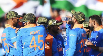 pakistan calls for icc action over india army camouflage caps