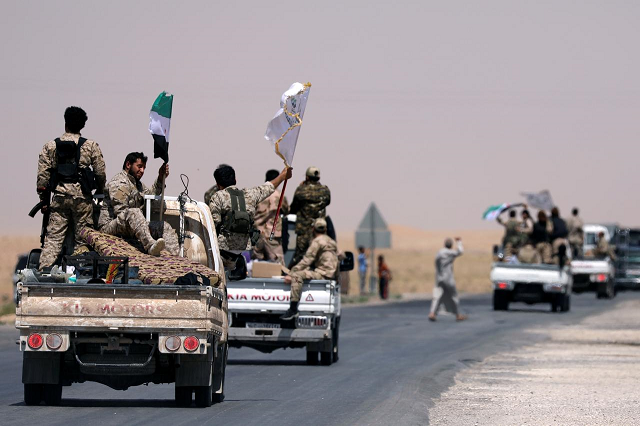 backed by the us led coalition the sdf renewed its assault sunday after warning remaining islamic state fighters their time was up photo reuters