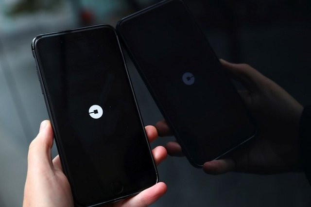 the uber logo is seen on mobile telephone in london britain september 25 2017 photo reuters the uber logo is seen on mobile telephone in london britain september 25 2017 photo reuters