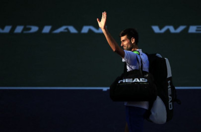 kohlschreiber stuns djokovic at indian wells rafa federer advance