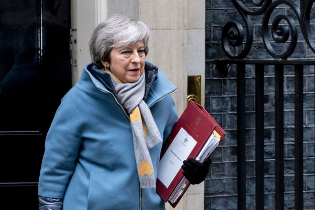 britain 039 s prime minister theresa may leaves 10 downing street in london on march 13 2019 photo afp