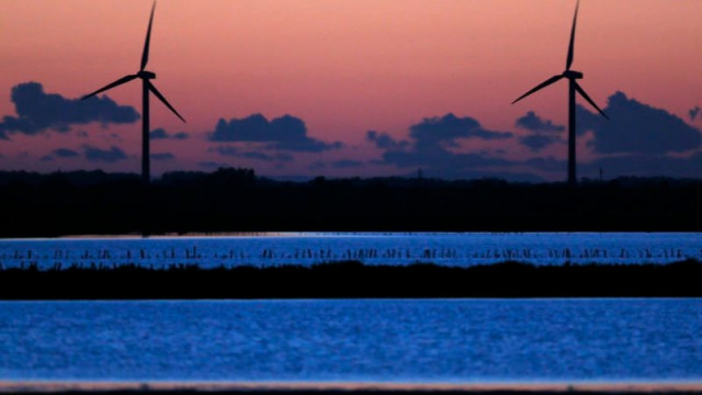 power generating windmill turbines are seen at sunset photo reuters power generating windmill turbines are seen at sunset photo reuters