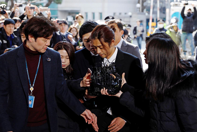 south korean singer jung joon young arrives for questioning on accusations of illicitly taping and sharing sex videos on social media at the seoul metropolitan police agency in seoul south korea march 14 2019 photo reuters south korean singer jung joon young arrives for questioning on accusations of illicitly taping and sharing sex videos on social media at the seoul metropolitan police agency in seoul south korea march 14 2019 photo reuters