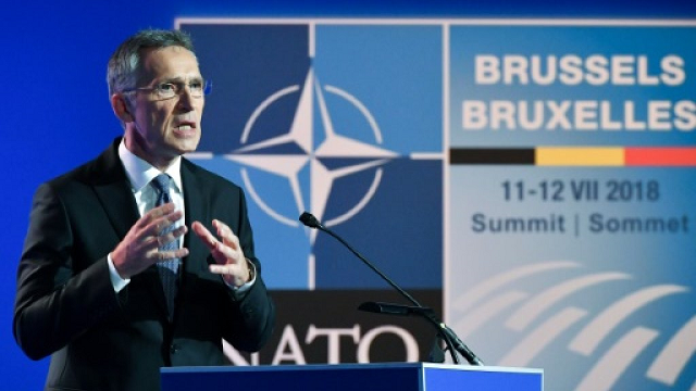 nato secretary general jens stoltenberg announces that seven european countries will meet the two percent of gdp defence spending target this year photo afp