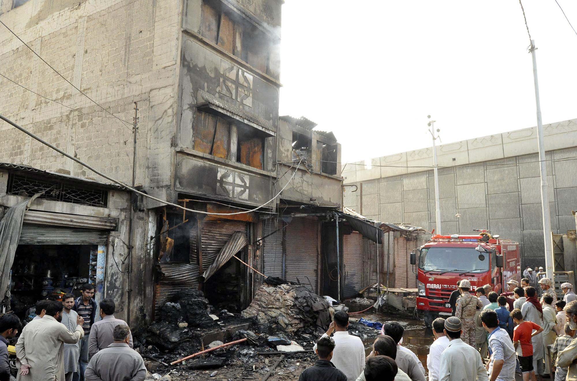 rescue efforts firefighters attempt to douse a fire that broke out at a warehouse in shershah market on thursday the city 039 s preparedness for an emergency situation has left a question mark on the authorities