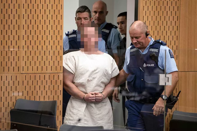 brenton tarrant the man charged in relation to the christchurch massacre is lead into the dock for his appearance in the christchurch district court photo afp brenton tarrant the man charged in relation to the christchurch massacre is lead into the dock for his appearance in the christchurch district court photo afp