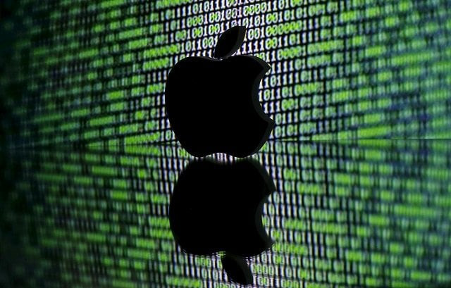 a 3d printed apple logo is seen in front of a displayed cyber code in this illustration taken march 22 2016 photo reuters a 3d printed apple logo is seen in front of a displayed cyber code in this illustration taken march 22 2016 photo reuters
