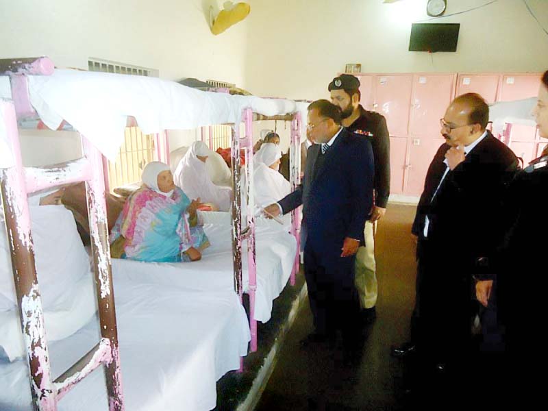 judge chaudhry mumtaz hussain judge basheer bhatti and ac hasan waqar talk to women prisoners at adyala jail photo express