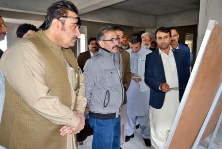 chief secretary dr akhtar nazeer is being briefed by officials about the under construction building of digital library in khuzdar photo express