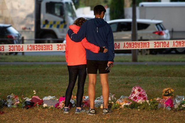 large crowds in christchurch many carrying bouquets of flowers headed to memorials sunday to share messages of love to the victims and their families photo afp large crowds in christchurch many carrying bouquets of flowers headed to memorials sunday to share messages of love to the victims and their families photo afp