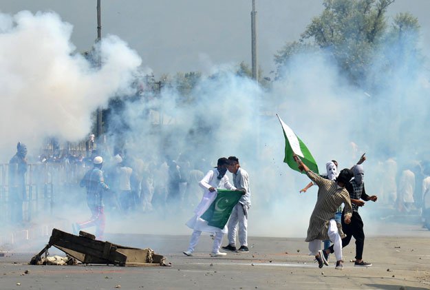 indian forces hurl tear gas at kashmiri protesters in sringar photo afp file