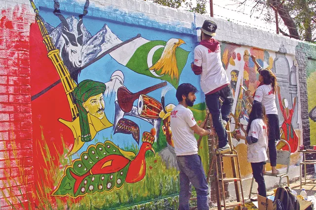 students paint a mural at wahdat road in lahore photo ppi students paint a mural at wahdat road in lahore photo ppi