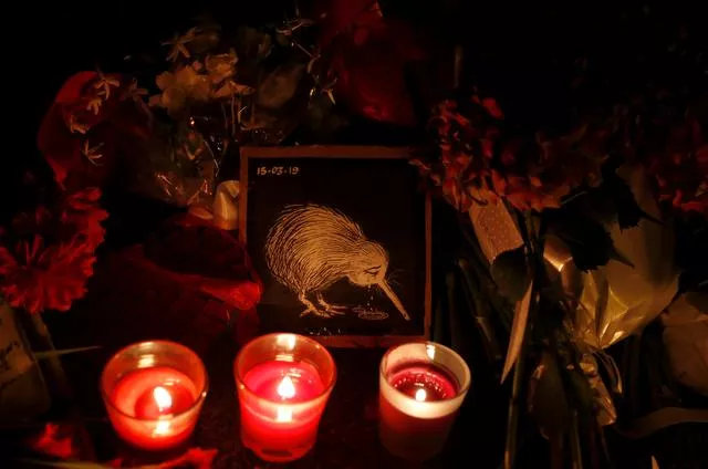 candles are flowers placed at a memorial site for victims of the mosque shootings are pictured at the botanic gardens in christchurch new zealand march 17 2019 photo reuters candles are flowers placed at a memorial site for victims of the mosque shootings are pictured at the botanic gardens in christchurch new zealand march 17 2019 photo reuters