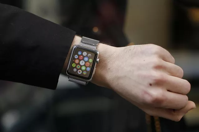 a customer presents his apple watch after buying it at a store in paris france april 24 2015 photo reuters a customer presents his apple watch after buying it at a store in paris france april 24 2015 photo reuters