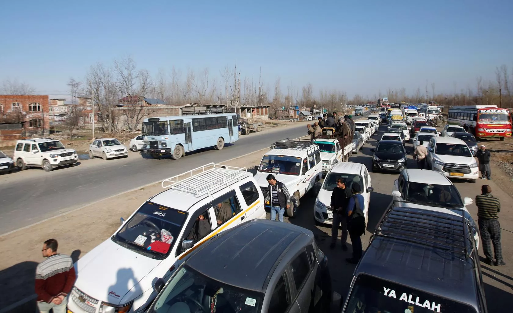 traffic is stopped as the indian central reserve police force crpf convoy moves along a national highway in qazigund march 18 2019 photo reuters traffic is stopped as the indian central reserve police force crpf convoy moves along a national highway in qazigund march 18 2019 photo reuters