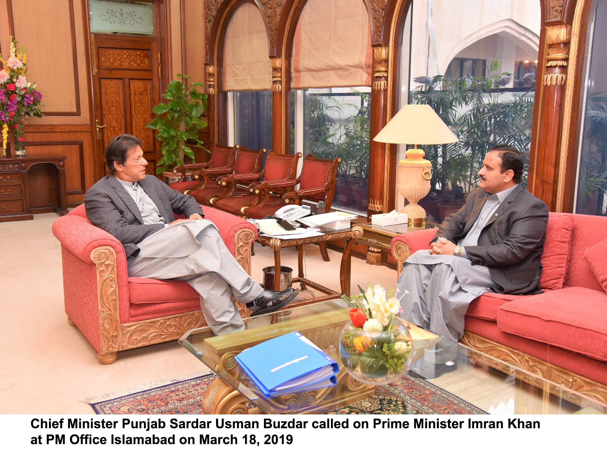 chief minister punjab sardar usman buzdar calls on prime minister imran khan at the pm office islamabad on march 18 2019 photo pid