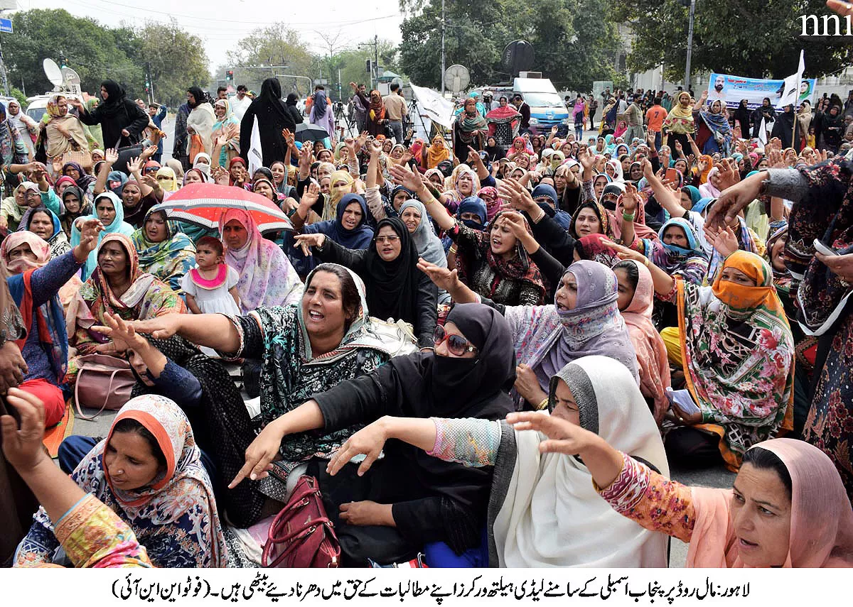 lady health workers stage sit in on mall road photo nni lady health workers stage sit in on mall road photo nni