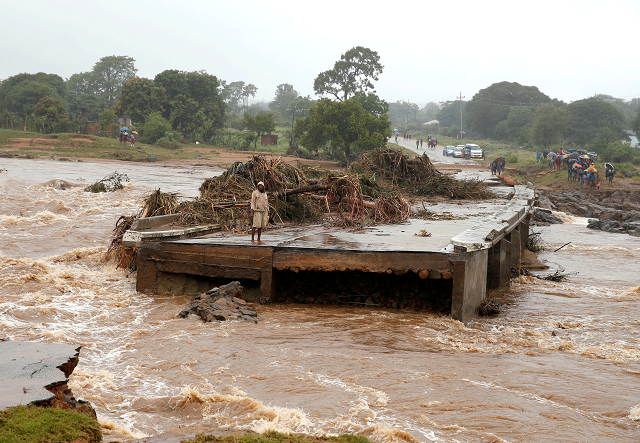 a man looks at a washed away bridge along umvumvu river following cyclone idai in chimanimani zimbabwe photo reuters a man looks at a washed away bridge along umvumvu river following cyclone idai in chimanimani zimbabwe photo reuters