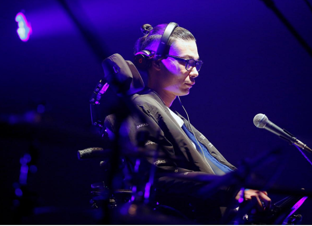 muto who lost the use of his hands to lou gehrig s disease wears a pair of high tech glasses connected to an app that controls music mixing software photo reuters