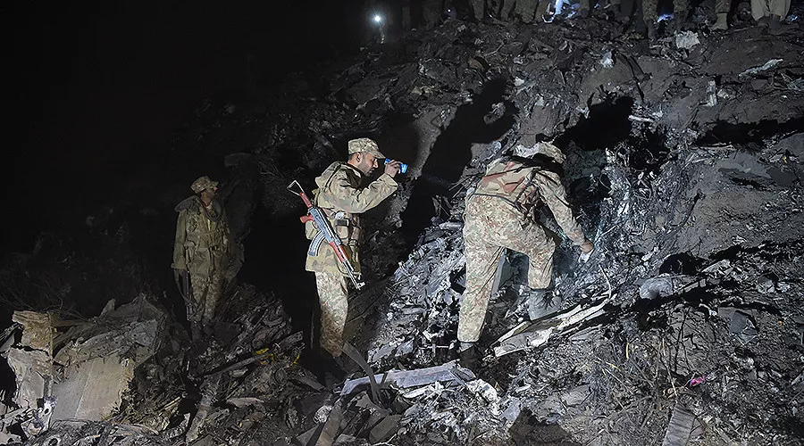 soldiers search for victims from the wreckage of the crashed pia passenger plane flight pk661 at the site near abbottabad on december 7 2016 photo afp file soldiers search for victims from the wreckage of the crashed pia passenger plane flight pk661 at the site near abbottabad on december 7 2016 photo afp file