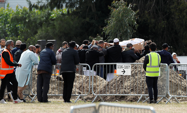 the body of a victim of the mosque attacks is carried during the burial ceremony at the memorial park cemetery in christchurch photo reuters the body of a victim of the mosque attacks is carried during the burial ceremony at the memorial park cemetery in christchurch photo reuters