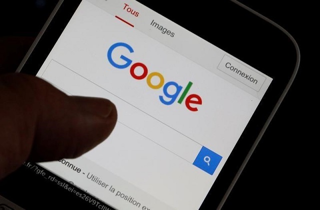 a man holds his smartphone which displays the google home page in this picture illustration taken in bordeaux southwestern france august 22 2016 photo reuters