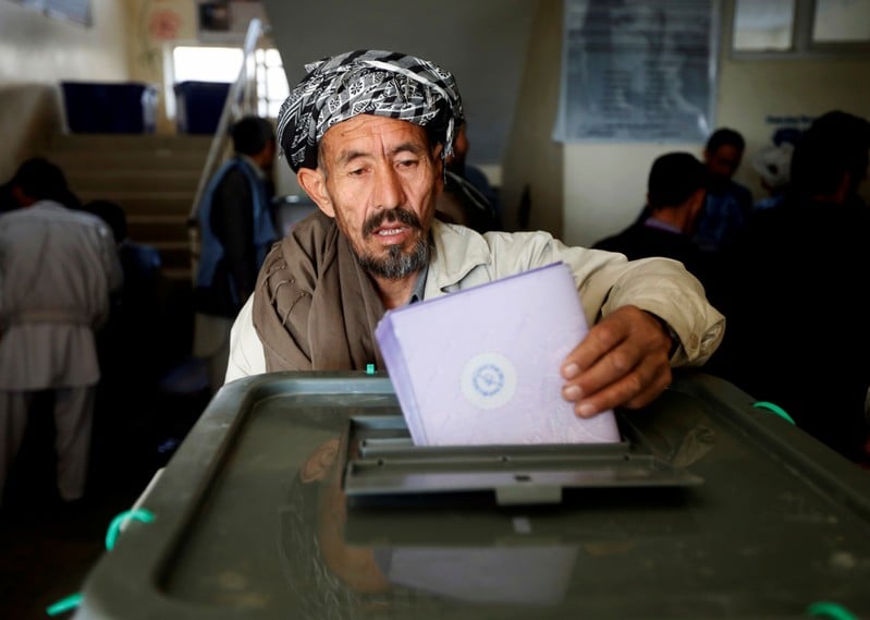 an afghan man casts his vote during the parliamentary election at a polling station in kabul photo reuters